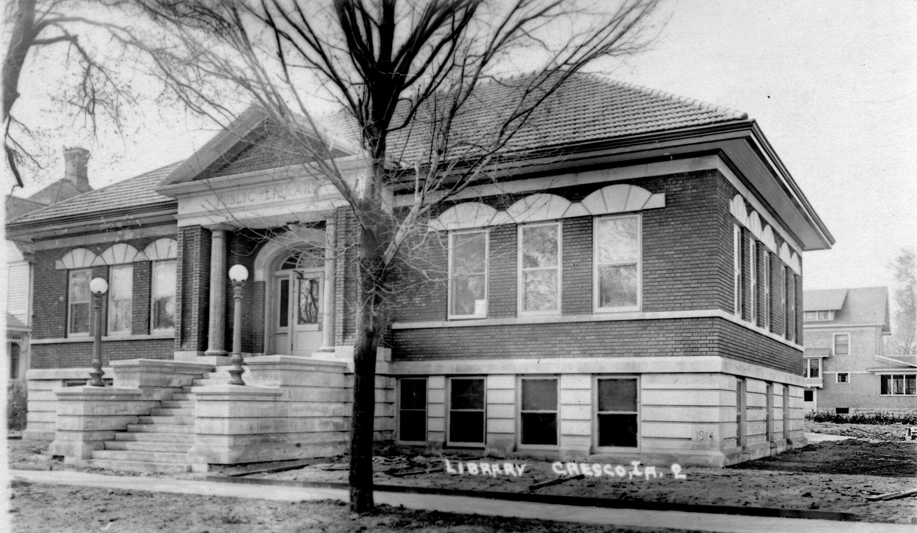 Black and white image depicting the front exterior of the Cresco Public Library. Source: unknown.