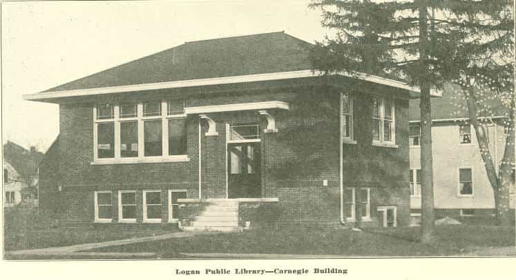 Black and white image depicting the front exterior of the Logan Public Library. Taken from the 11th Report of the Iowa Library Commission, coverage 1920-1922. (Published in 1922), reverse title page (title page verso.)