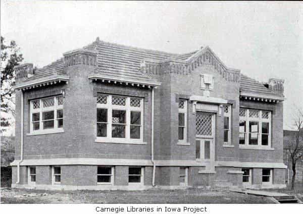 Black and white photograph depicting the front exterior of the Nashua Public Library. 