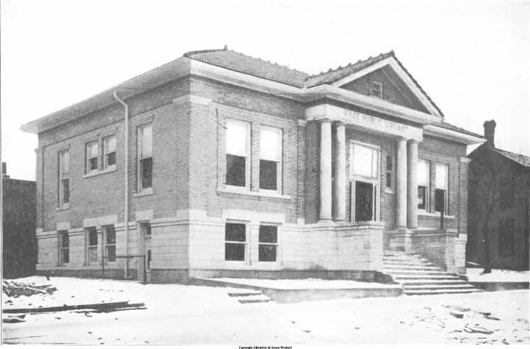 Black and white photograph depicting the front exterior of the Villisca Public Library. 