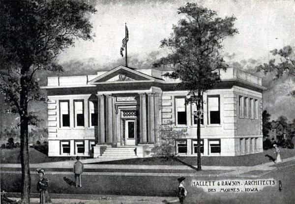 Black and white illustration showing the front exterior of the Ames Public Library. Tree is partially blocking view of the building. Several people are standing around the library. An American flag is also visible. Text reads "Mallett & Rawson, Architects Des Moines, Iowa." Taken from the 1st Report of the Iowa Library Commission, coverage 1900-1903. (Published in 1904), opposite page 75.
