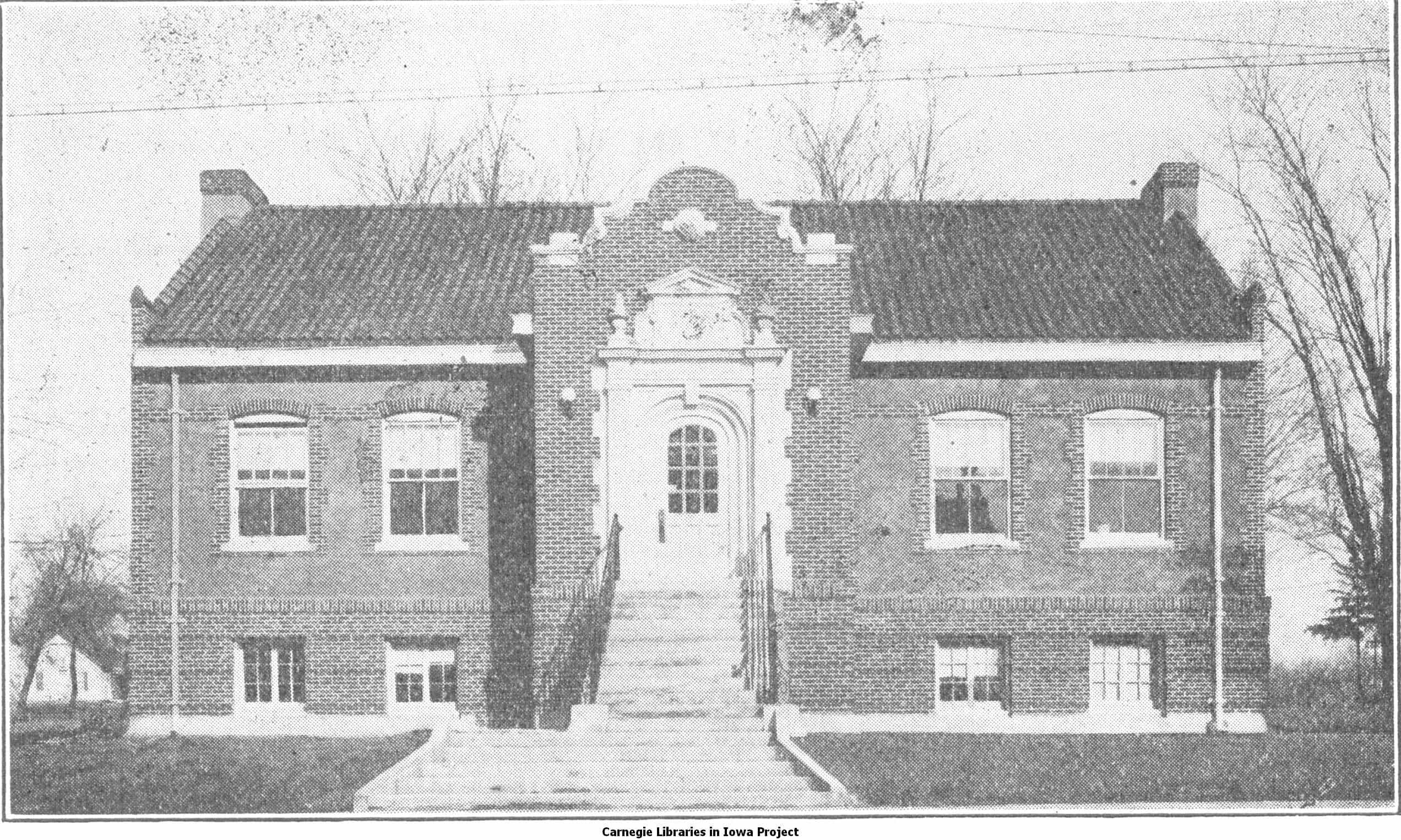 Black and white image showing the front exterior of the Bedford Public Library. Taken from the 9th Report of the Iowa Library Commission, coverage 1916-1918. (Published in 1918), page 16.