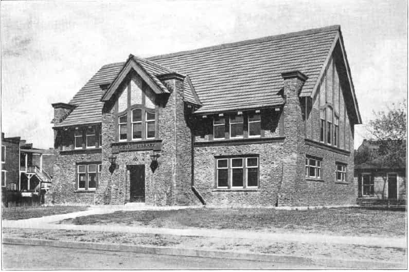 Black and white image depicting the front exterior of the Red Oak Public Library. Taken from the 5th Report of the Iowa Library Commission, coverage 1908-1910. (Published in 1909), opposite title page (frontispiece.)