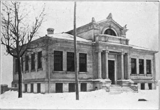 Black and white image showing the exterior of the East Waterloo Public Library. 