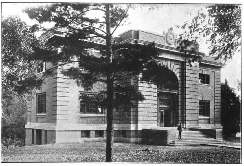 Black and white image showing the front exterior of the Cornell College Library/Mount Vernon Public Library. Tree partially blocking view of the image. The City of Mount Vernon and Cornell College both provided annual support to match Andrew Carnegie