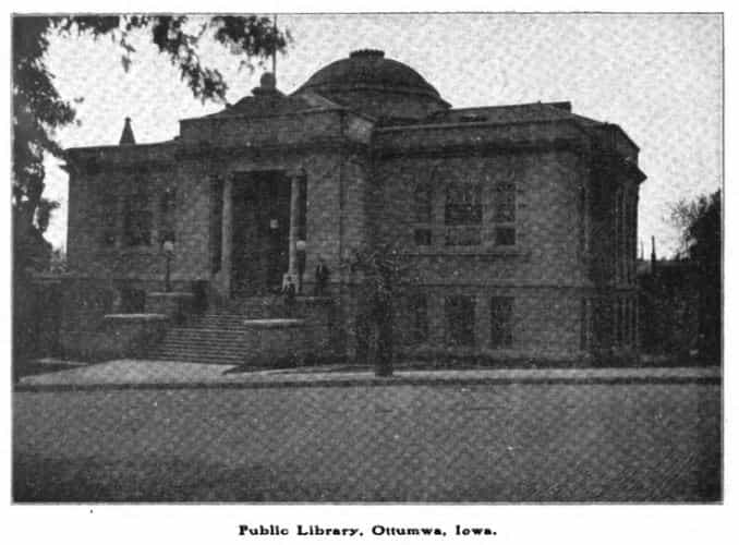 This black and white image depicts the front exterior of the Ottumwa Public Library. 